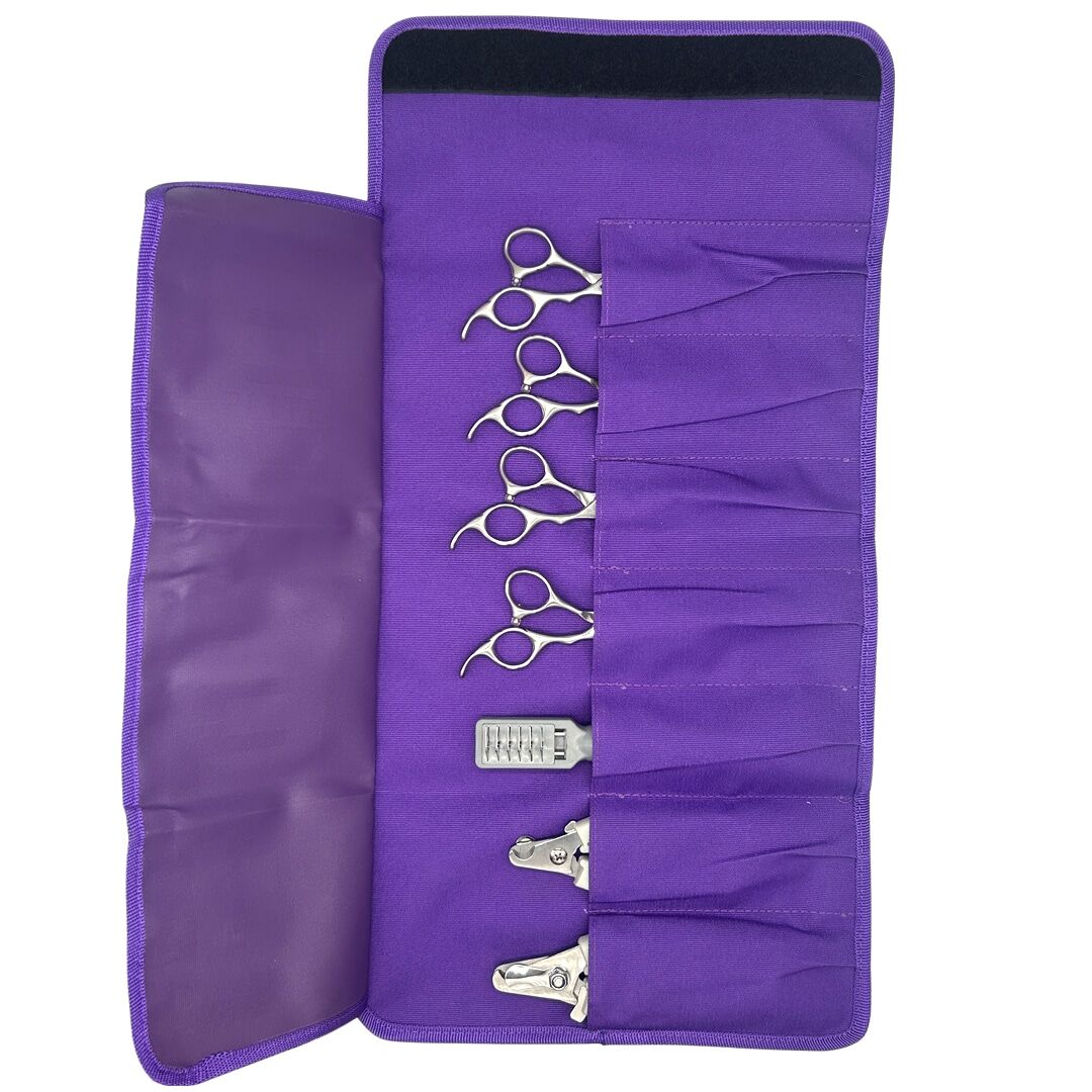 Purple Tool kit opened with tools Professional Roll Out tool bad for securing your grooming tools